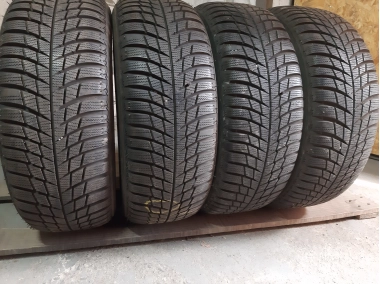 Шини на авто в хорошому стані Bridgestone Blizzak LM-001 шириною 195 висотою 55 радіусом R 16 низькі ціни
